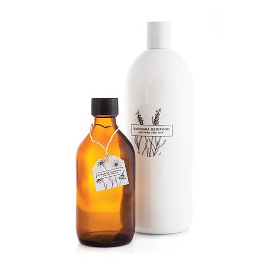 Amber bottle and white plastic bottle refills